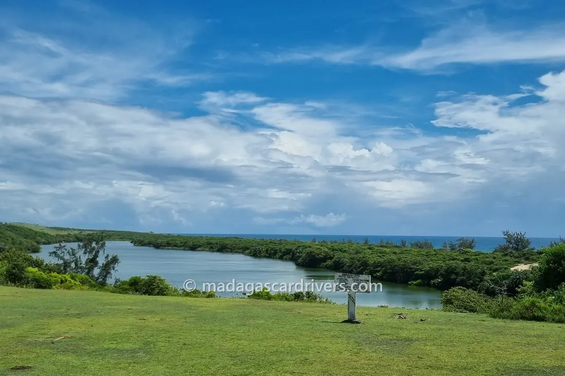 A mangrove lagoon opening to the Indian Ocean under a wide sky, north-east Madagascar